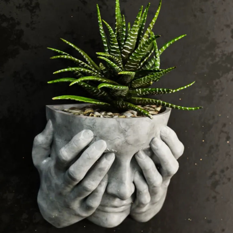 Woman Covering Face Wall Planter