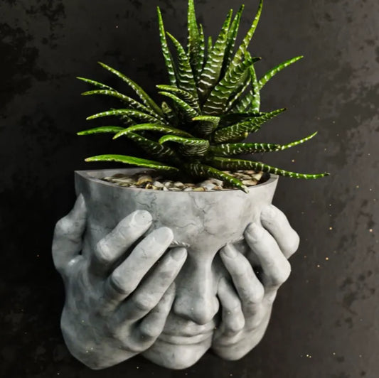 Woman Covering Face Wall Planter
