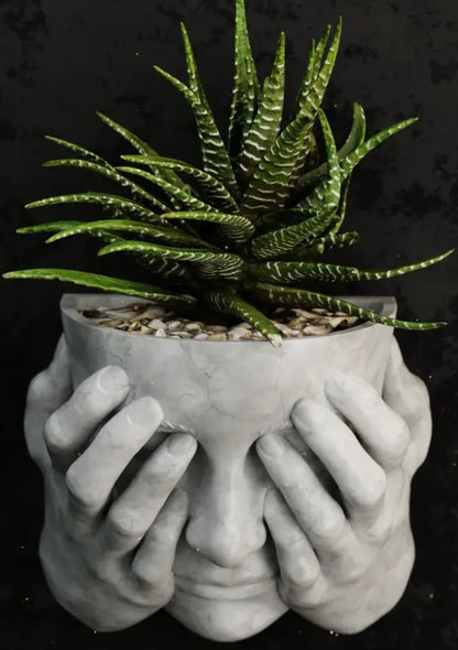 Woman Covering Face Wall Planter