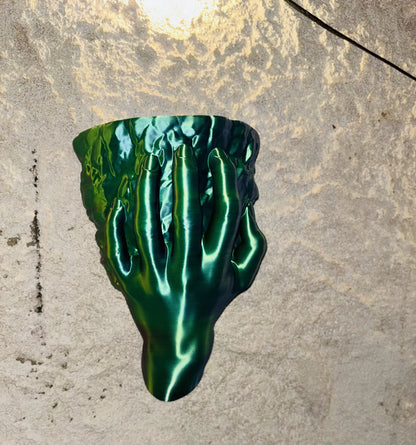 Hand Holding Rock Wall Planter