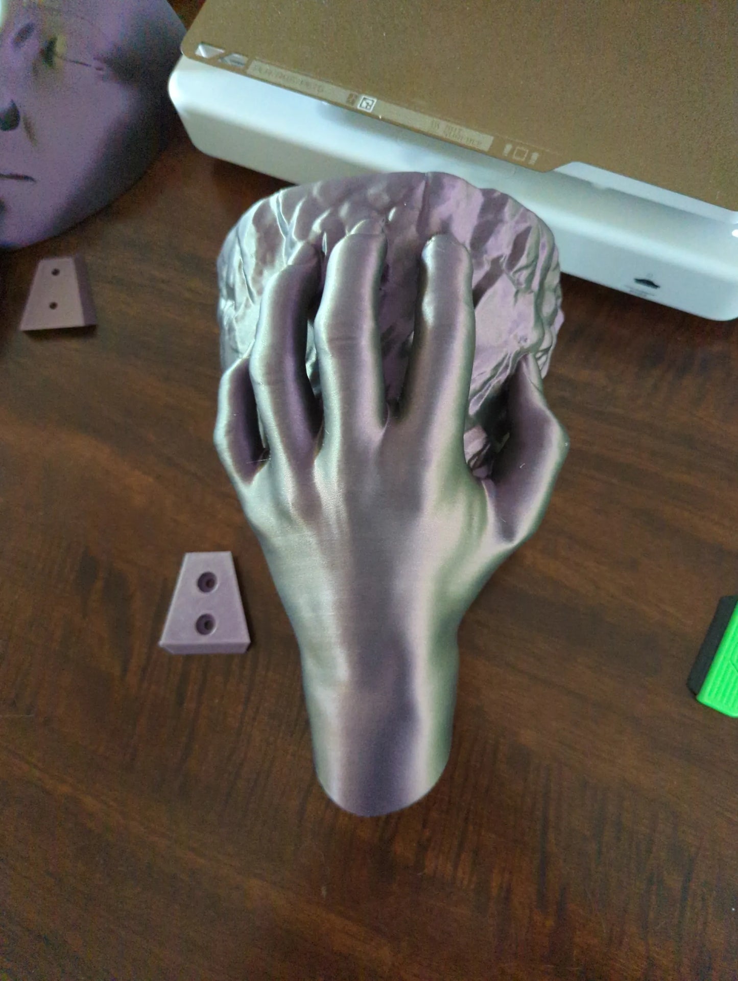 Hand Holding Rock Wall Planter